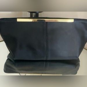 Black magnet clutch gold detail